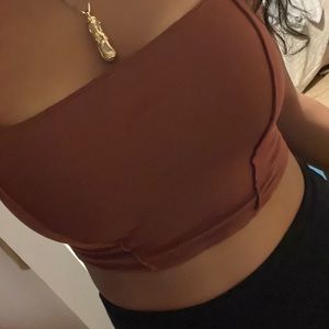 Maroon spaghetti strap with two ribbed lines to give a curvy effect